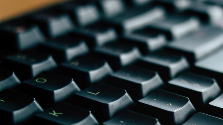 close up photo of black razer computer keyboard