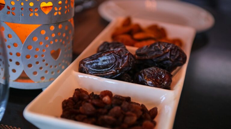 close up photo of raisins and dates